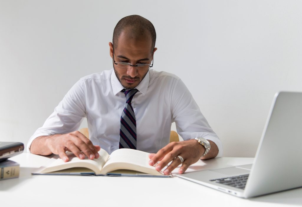 Law student reading textbook